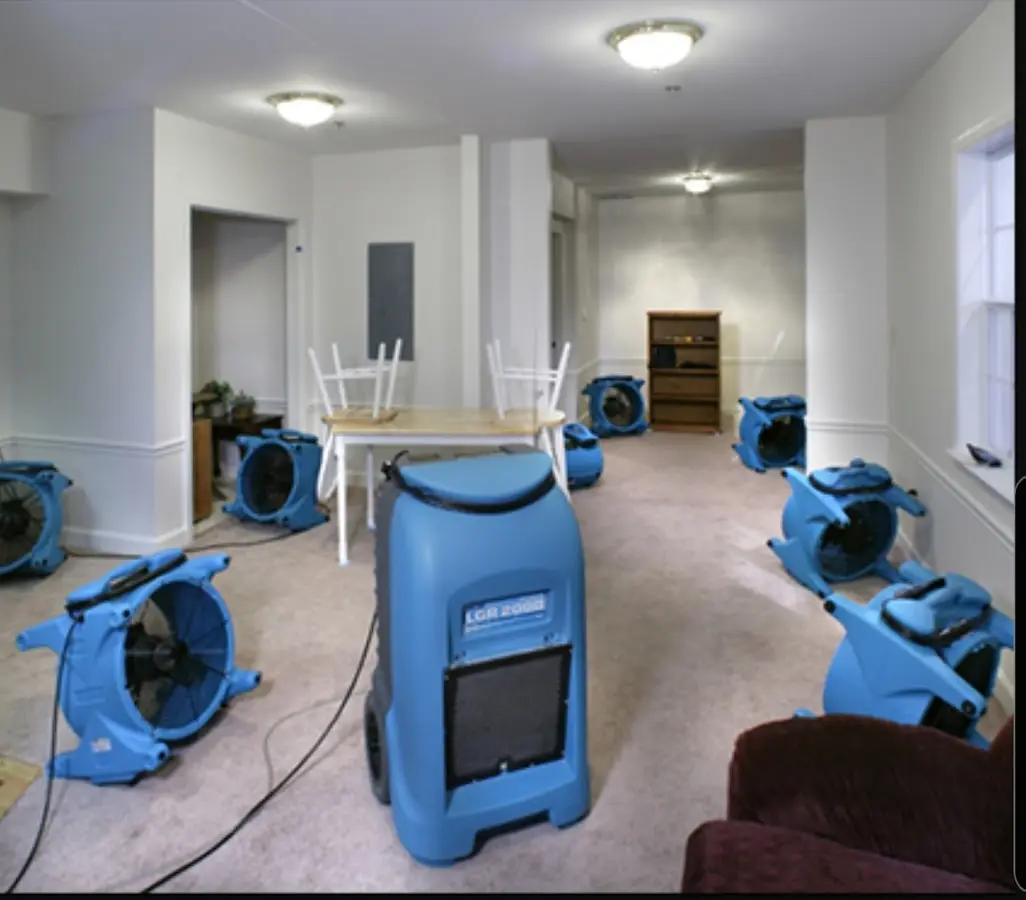 Air movers and dehumidifier setup for Water Damage Restoration in Creedmoor